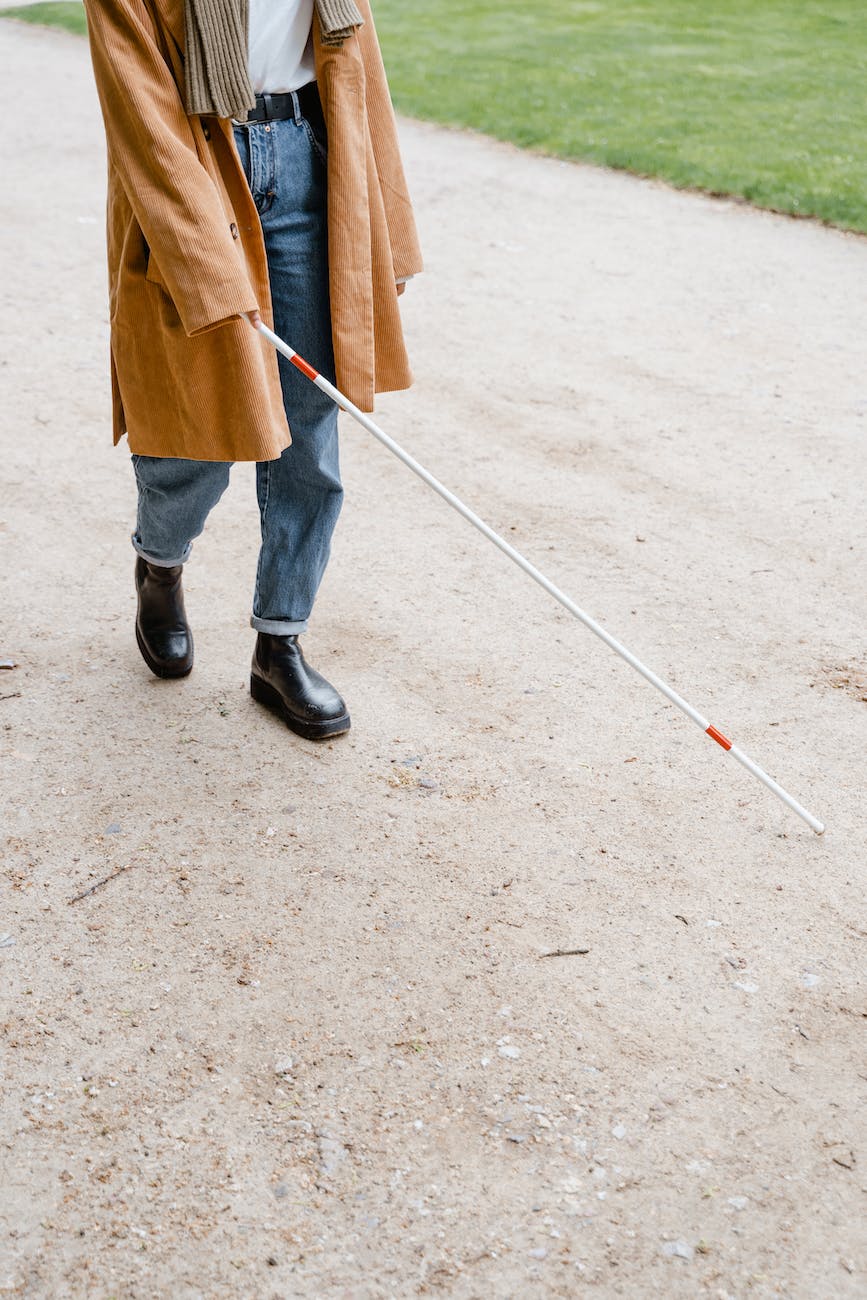 a person walking with a cane, blind, vision, trusting God's vision for our life